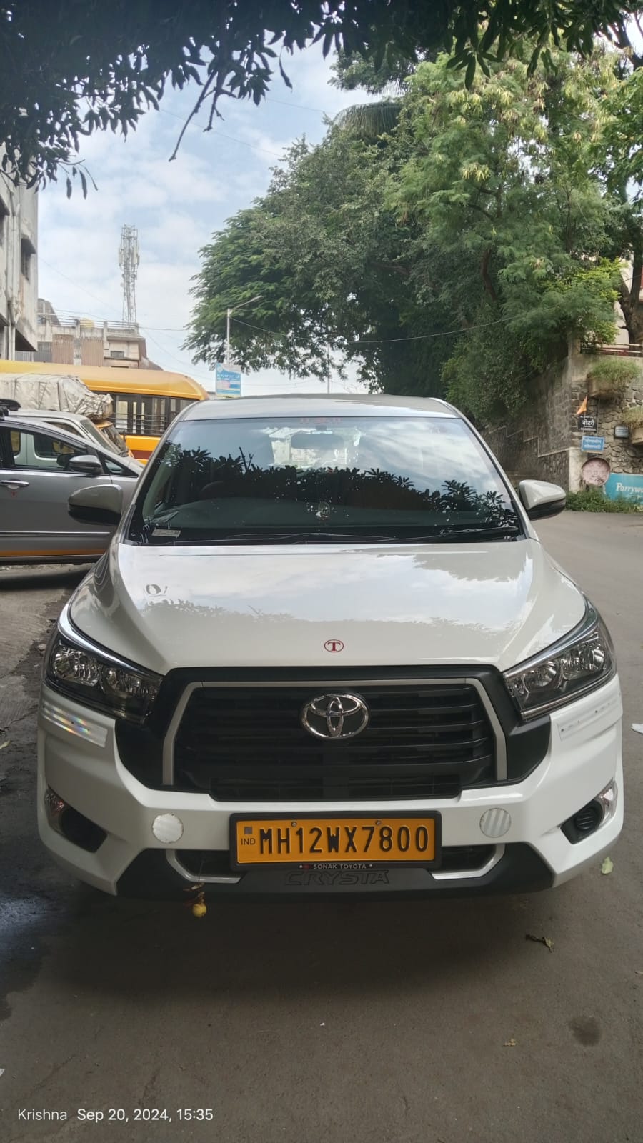 White Innova Crysta front view